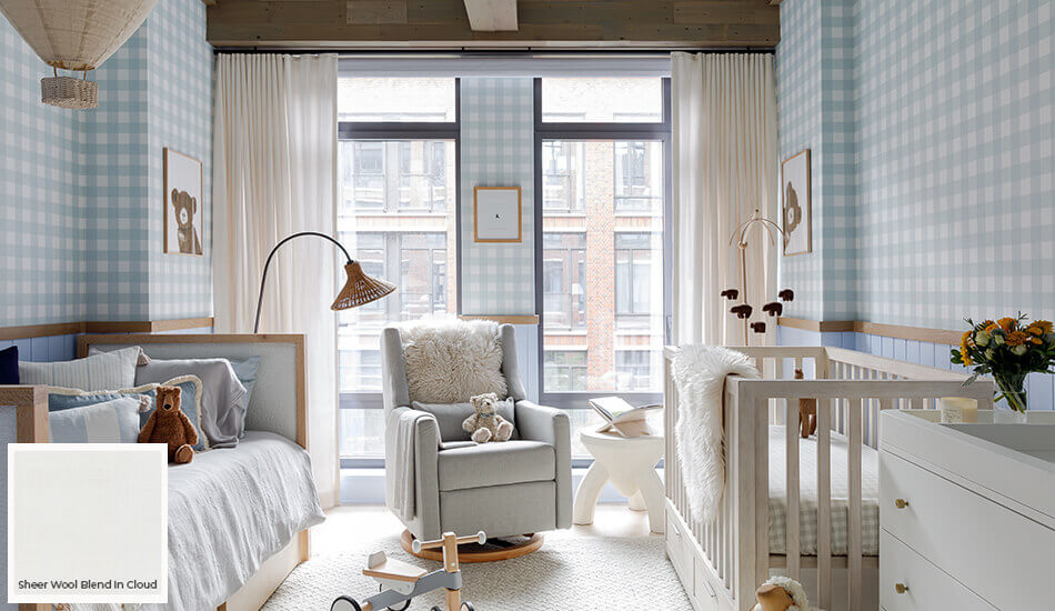 One of the latest window treatment trends is the use of sheer drapery seen on these Ripple Fold Drapes in a well-lit nursery