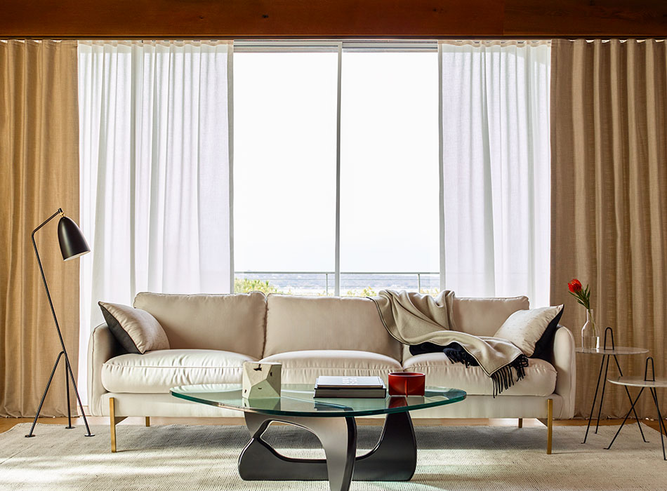 Layered Ripple Fold Drapery in Alma Gravel and Neblina Snow used as a sliding glass door curtain