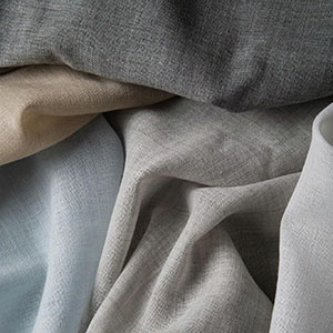 One of the window treatment trends of 2026 is the use of Wool Challis as evinced by these swatches of different colors