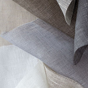 Popular trending window treatment ideas include the use of luxe sheer linen as evinced by these swatches of different colors