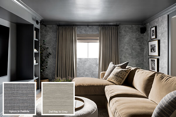 Upton in Pebble, one of the trending window dressing ideas, seen here adorning tailored pleat drapery in a finished basement